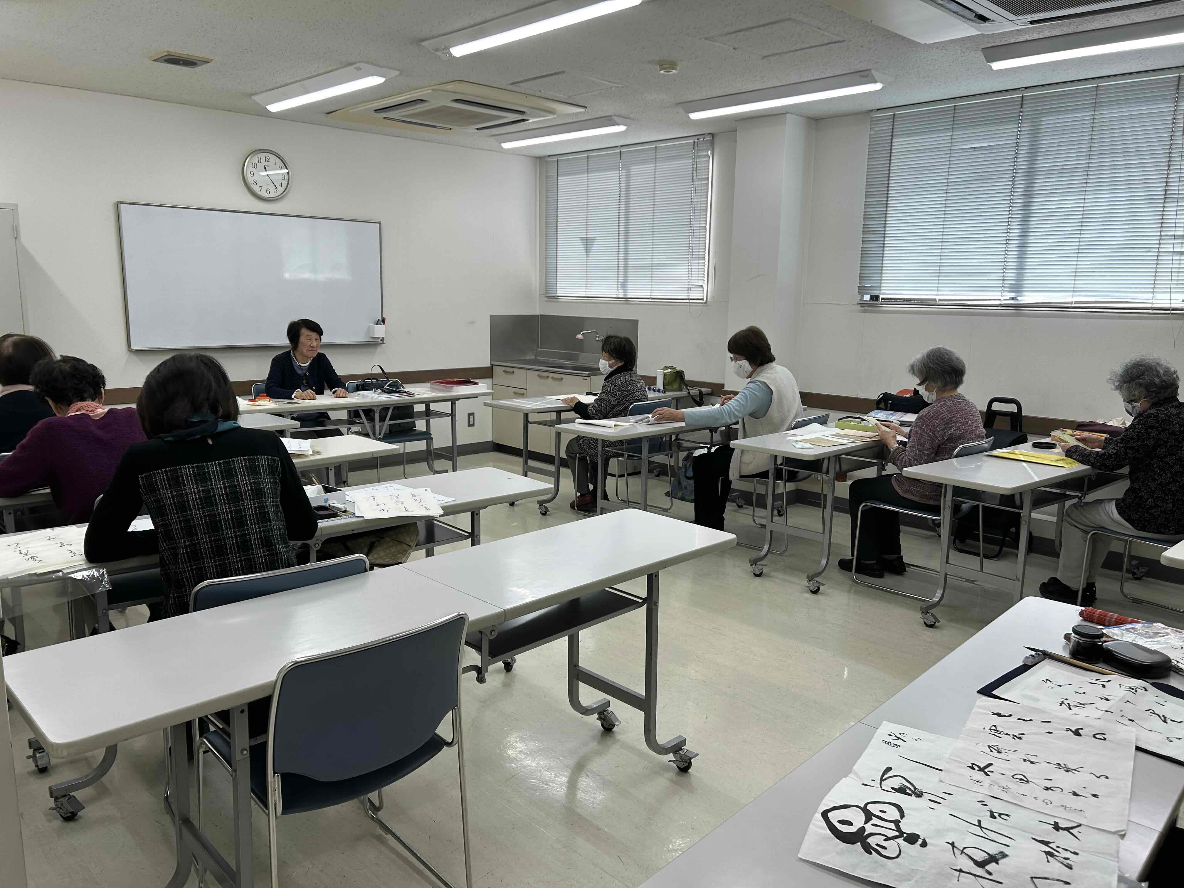 小倉百人一首でかな書道